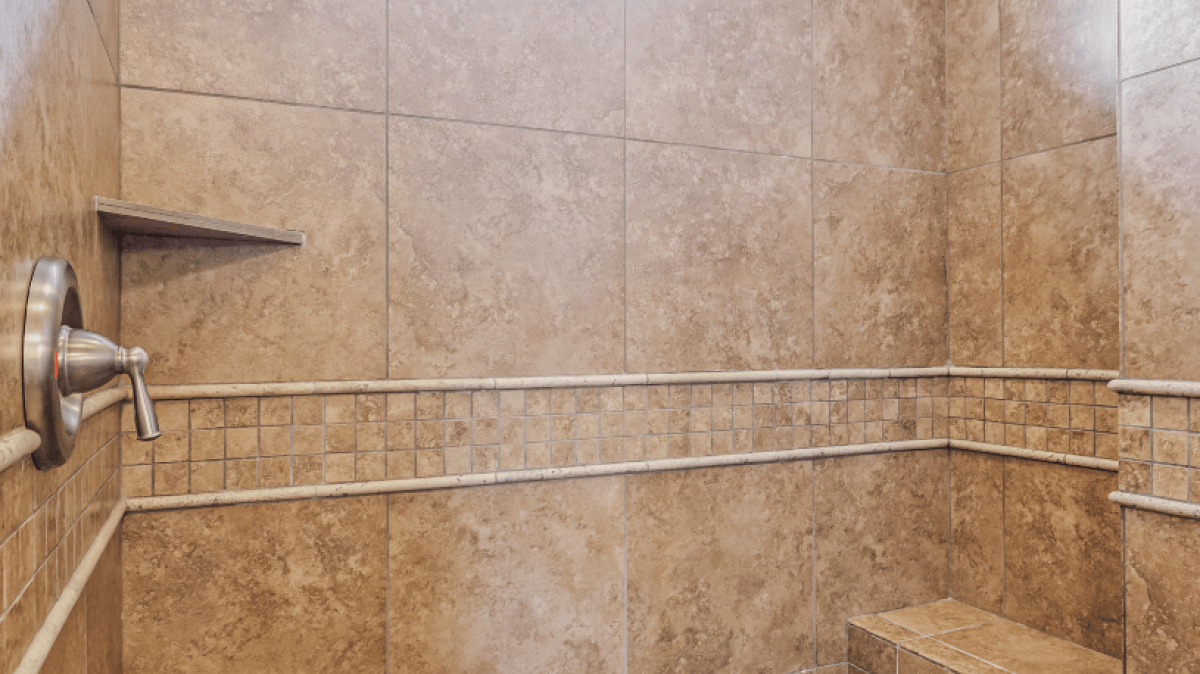 a room with a sink and a mirror